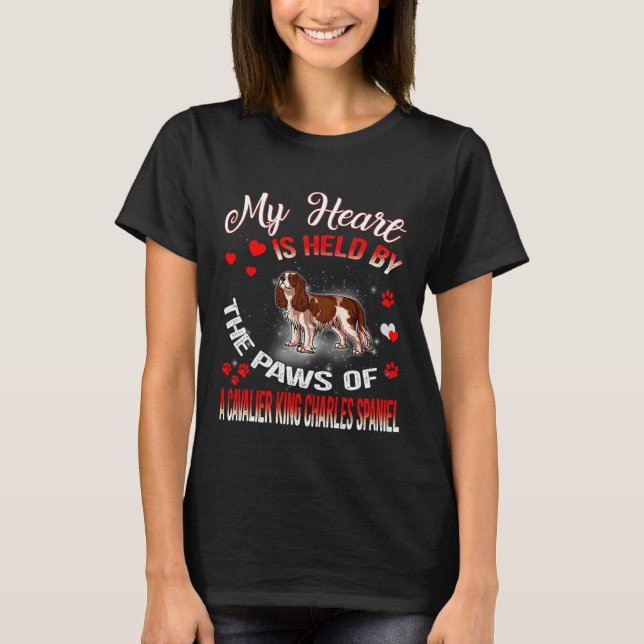 Heart Is Held By The Paws Of A Cavalier King Charl T-Shirt (Front)