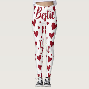 Heart pattern with "Bestie" text in cursive red Leggings