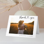 Heart Script Minimalist Photo Wedding Thank You Card<br><div class="desc">Capture the essence of your special day with our exclusive personalised wedding thank you fold card, thoughtfully designed for newlyweds. The front cover proudly displays your chosen photo, accompanied by your names in a sleek, contemporary font, and a heartfelt 'Thank You' in modern script, accentuated with a cute heart nestled...</div>