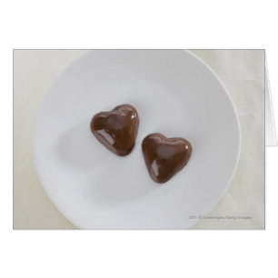Heart shaped chocolate candies on a plate
