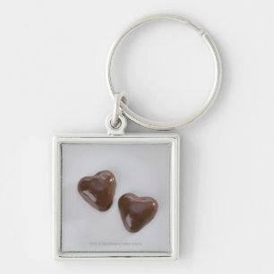 Heart shaped chocolate candies on a plate key ring