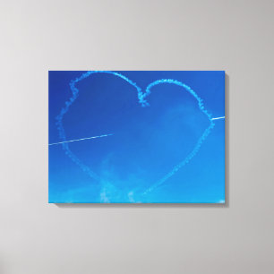 Heart-shaped plane trails view canvas print