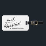 Heart & Swirly Script Just Married Luggage Tag<br><div class="desc">Find your luggage easily on your honeymoon with this beautiful "just married" luggage tag in black and white. Just married is written in a beautifully swirly script. Customise with your names for the perfect honeymoon luggage tag.</div>
