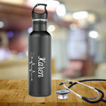 Heartbeat Stethoscope Monogram   710 Ml Water Bottle<br><div class="desc">This premium water bottle is designed with a stethoscope heartbeat pattern,  celebrating the dedicated healthcare professionals and their commitment to saving lives. Stay hydrated in style while paying tribute to your noble profession with this sleek and practical water bottle.</div>