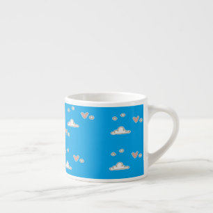 Hearts and clouds on blue espresso cup