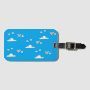 Hearts and clouds on blue luggage tag