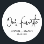 Heather Elegant Black White Minimal Modern Wedding Classic Round Sticker<br><div class="desc">Modern wedding favour stickers featuring a simple design with "Our Favourite" in an elegant script typography along with your names and wedding date in a minimalist sans serif font. All design elements are in black and white. A chic design for any style of wedding. These custom stickers are great for...</div>