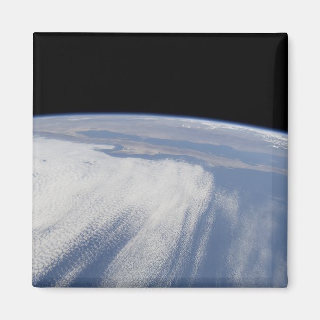 Heavy cloud cover over the Pacific Ocean Magnet (Front)
