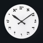 Hebrew Block Lettering Round Clock<br><div class="desc">The "Hebrew Essentials, " Consumer Marketplace offers a shopping experience as you will not find anywhere else. Our speciality is Hebrew,  and in our store your will find Hebrew in block,  script,  and Rashi script.  Tell your friends about us and send them our link:  http://www.zazzle.com/HebrewNames?rf=238549869542096443*  ENJOY YOUR VISIT!</div>