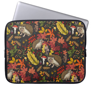 Hedgehogs and autumn forest flora on black laptop sleeve