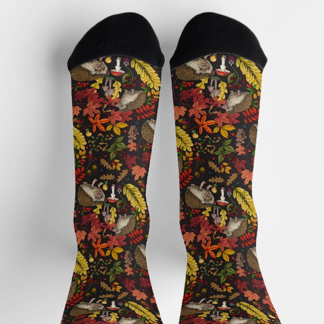 Hedgehogs and autumn forest flora on black socks (Top)