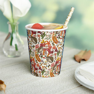 Hedgehogs and autumn forest flora on ivory paper cups