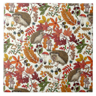 Hedgehogs and autumn forest flora on ivory tile