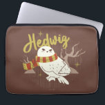 Hedwig Whimsical Forest Drawing Laptop Sleeve<br><div class="desc">Show your house spirit in the coziest way with this charming Hedwig™ design. Featuring the beloved snowy owl bundled up in a warm Gryffindor house-colored scarf, this playful illustration captures the magic and loyalty of Harry Potter’s trusted companion. Set against a whimsical woodland backdrop with subtle sparkling accents, the hand-drawn...</div>
