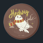 Hedwig Whimsical Forest Drawing Magnet<br><div class="desc">Show your house spirit in the coziest way with this charming Hedwig™ design. Featuring the beloved snowy owl bundled up in a warm Gryffindor house-colored scarf, this playful illustration captures the magic and loyalty of Harry Potter’s trusted companion. Set against a whimsical woodland backdrop with subtle sparkling accents, the hand-drawn...</div>