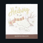 Hedwig Whimsical Forest Drawing Notepad<br><div class="desc">Show your house spirit in the coziest way with this charming Hedwig™ design. Featuring the beloved snowy owl bundled up in a warm Gryffindor house-colored scarf, this playful illustration captures the magic and loyalty of Harry Potter’s trusted companion. Set against a whimsical woodland backdrop with subtle sparkling accents, the hand-drawn...</div>