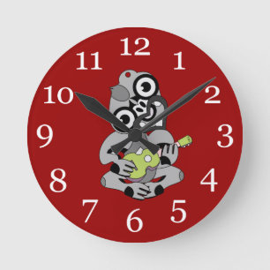 Hei Tiki playing ukelele Round Clock