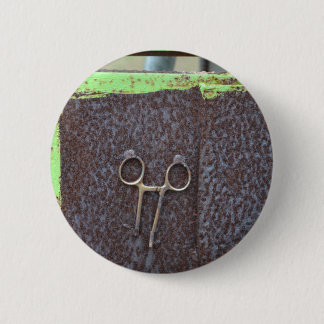 hemostat rusting metal grunge work 6 cm round badge