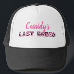 Her Last Rodeo Disco Cowgirl Bachelorette Party Trucker Hat<br><div class="desc">Celebrate brides to be with these disco cowgirl themed bachelorette party personalised hats. They feature the fun slogan "LAST RODEO" in black and white cow hide patterned letters with the bride's name above in pink script lettering.</div>