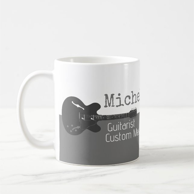 her professional (guitarist) half-grey half-white  coffee mug (Left)