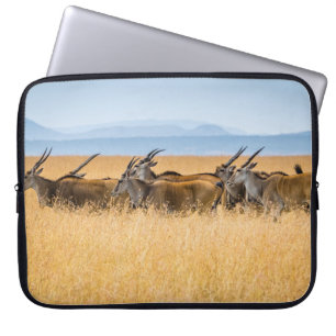HERD OF ANTELOPES ON GRASS FIELD LAPTOP SLEEVE