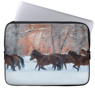 Herd of Horses Running in Snow Laptop Sleeve