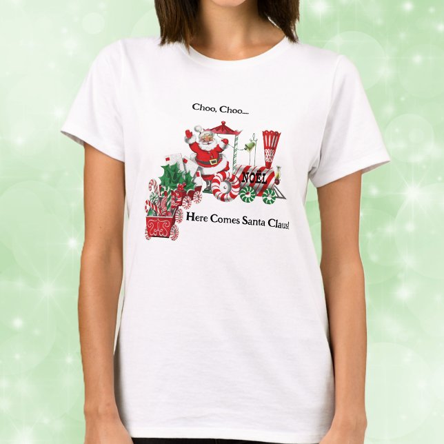 Here Comes Santa on Candy Train With Letters T-Shirt (Santa riding red white Christmas train candy canes letters on Here comes Santa tee shirt.)