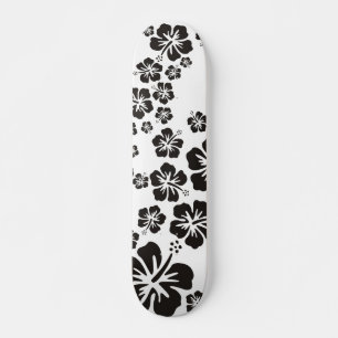 hibiscus blooms in black skateboard