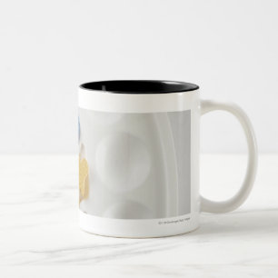 High angle view of alphabets on a palette Two-Tone coffee mug