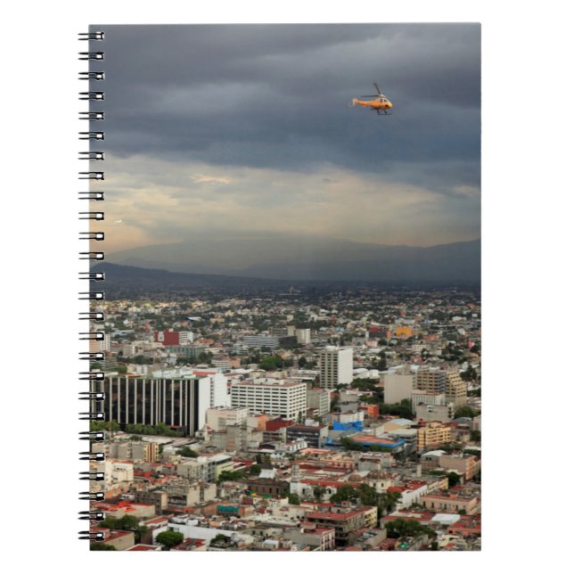 High Angle View Of Cityscape Against Cloudy Sky Spiral Notebook (Front)
