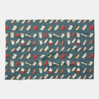 high heels pitchers and folded fabrics tea towel