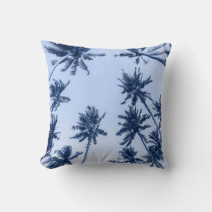 High palm trees, clear blue sky. cushion