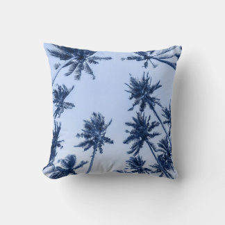 High palm trees, clear blue sky. cushion