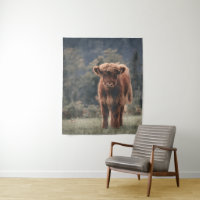 Highland cow calf autumn grass field