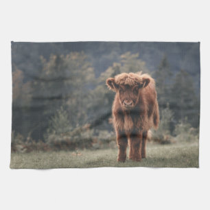 Highland cow calf autumn grass field tea towel