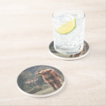 Highland cow calf autumn grass monogram initial coaster<br><div class="desc">Highland cow calf autumn grass field photograph. Stunning young calf of highland scottish cattle on an autumn grassy field with muted colours. Beautiful dark hairy orange coat contrasting with light yellow green grass and trees in bokeh in background. Custom personalizable monogram with your name and inital on the left.</div>