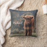 Highland cow calf autumn grass monogram initial cushion<br><div class="desc">Highland cow calf autumn grass field photograph. Stunning young calf of highland scottish cattle on an autumn grassy field with muted colours. Beautiful dark hairy orange coat contrasting with light yellow green grass and trees in bokeh in background. Custom personalizable monogram with your name and inital on the left.</div>