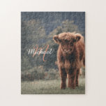 Highland cow calf autumn grass monogram initial jigsaw puzzle<br><div class="desc">Highland cow calf autumn grass field photograph. Stunning young calf of highland scottish cattle on an autumn grassy field with muted colours. Beautiful dark hairy orange coat contrasting with light yellow green grass and trees in bokeh in background. Custom personalizable monogram with your name and inital on the left.</div>