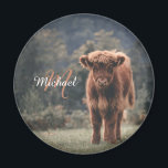 Highland cow calf autumn grass monogram initial magnet<br><div class="desc">Highland cow calf autumn grass field photograph. Stunning young calf of highland scottish cattle on an autumn grassy field with muted colours. Beautiful dark hairy orange coat contrasting with light yellow green grass and trees in bokeh in background. Custom personalizable monogram with your name and inital on the left.</div>