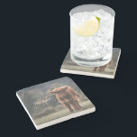 Highland cow calf autumn grass monogram initial stone coaster<br><div class="desc">Highland cow calf autumn grass field photograph. Stunning young calf of highland scottish cattle on an autumn grassy field with muted colours. Beautiful dark hairy orange coat contrasting with light yellow green grass and trees in bokeh in background. Custom personalizable monogram with your name and inital on the left.</div>