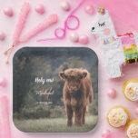 Highland cow calf monogram first birthday party paper plate<br><div class="desc">Highland cow calf monogram first birthday party. Stunning young calf of highland scottish cattle on an autumn grassy field with muted colours. Beautiful dark hairy orange coat contrasting with light yellow green grass and trees in bokeh in background. Custom personalizable monogram with your name and initial on the left. Everything...</div>
