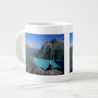 Hiker overlooking turquoise-coloured Lake