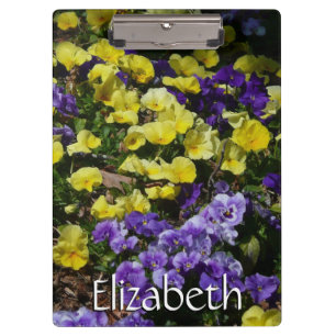 Hillside of Purple and Yellow Pansies Clipboard