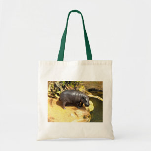 Hippo enjoying the spring sunshine tote bag