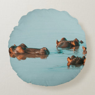 HIPPOS COOLING OFF IN THE DAM ROUND CUSHION