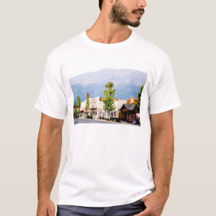 Historic stores at night on Main Street T-Shirt