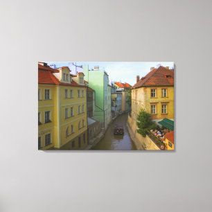 Historical buildings with canal, Prague, Czech Canvas Print