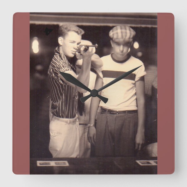 hit the target and win a kewpie doll square wall clock (Front)