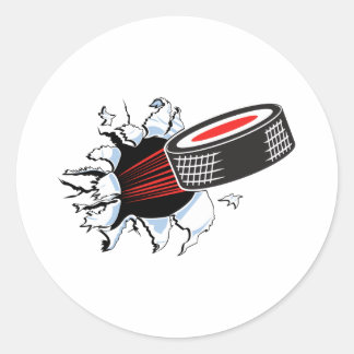 hockey puck ripping through classic round sticker