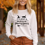 Hocus Pocus Halloween Quote Women's T-Shirt<br><div class="desc">Celebrate Halloween with this "It's just a bunch of Hocus Pocus" witch quote women's long sleeve graphic t-shirt. Decorative typography lettering is accented with spooky scrolls,  twinkling stars,  a witch hat,  black cat,  and a witch's broomstick. Black colour scheme can be modified.</div>